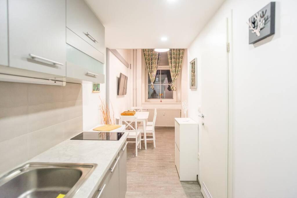 Apartma N'poznam Tobacna Apartament